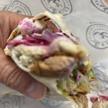 Kotti Berliner Doner Kebab - a hand holding a sandwich - Kebab Near Me - New York, New York