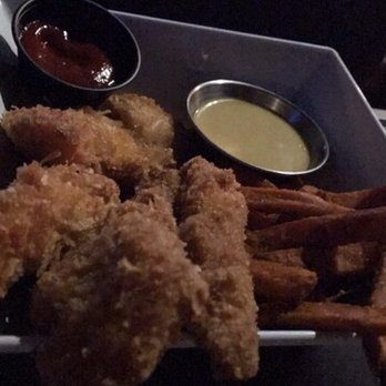 Studio Movie Grill - Coconut chicken tenders with sweet potato fries! - Cinema Near Me - Plano, Texas Studio Movie Grill - Coconut chicken tenders with sweet potato fries! - Cinema Near Me - Plano, Texas