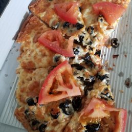 a slice of pizza with tomatoes and olives a slice of pizza with tomatoes and olives