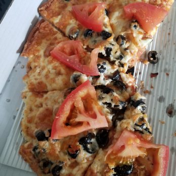 Royal Pizza - a slice of pizza with tomatoes and olives - Pizza Near Me - Edmonton, Alberta Royal Pizza - a slice of pizza with tomatoes and olives - Pizza Near Me - Edmonton, Alberta