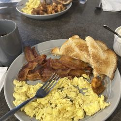 Breakfast plate with bacon.