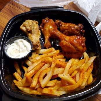 Wings Etc - Cajun fries and wings. Don't forget the house made blue cheese! - Chicken Wings Near Me - Springfield, Missouri