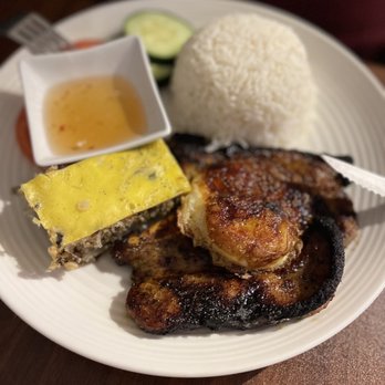 Le's Kitchen - 33. Grilled Pork Chop:  fried egg (hubby requested well cooked), pork chop, white rice, house meatloaf. Pleasantly different and yummy! - Vietnamese Near Me - Danbury, Connecticut
