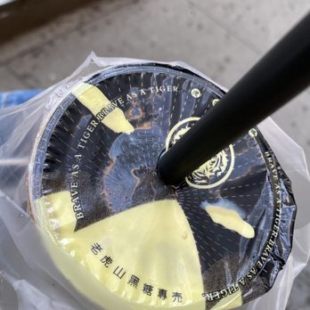 Tiger Hill - a paper plate with a black handle - Bubble Tea Near Me - Flushing, New York Tiger Hill - a paper plate with a black handle - Bubble Tea Near Me - Flushing, New York