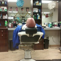 Alex's Barber Shop - Shaving that weirdos noggin