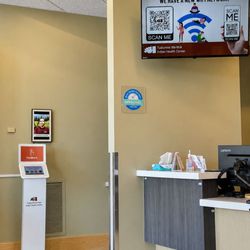 Tuolumne Me-Wuk Indian Health Center - The area towards the from desk featuring the physical therapist staff and letting you know about their WIFI