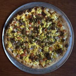 Fireside Pizza - Goetta Sunrise Specialty - housemade white gravy, Goetta, shredded American cheese, tomato, redo onion