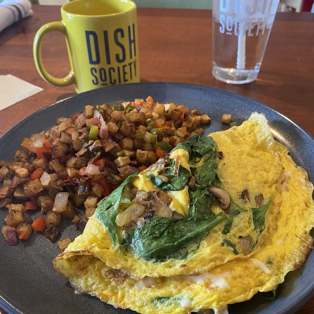 Dish Society - Cheese Omelette with mushrooms and spinach. A side of diced potatoes with mixed bell peppers and onions. - Breakfast & Brunch Near Me - Houston, Texas Dish Society - Cheese Omelette with mushrooms and spinach. A side of diced potatoes with mixed bell peppers and onions. - Breakfast & Brunch Near Me - Houston, Texas