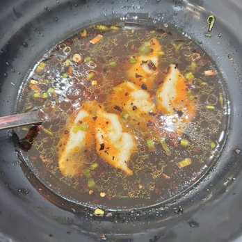 The Dumpling Zone - Pork and chive dumplings in sour soup - Chinese Near Me - Houston, Texas The Dumpling Zone - Pork and chive dumplings in sour soup - Chinese Near Me - Houston, Texas
