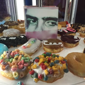 Voodoo Doughnut - Rotating doughnut stand in the shop so you can drool while waiting. - Donuts Near Me - Denver, Colorado Voodoo Doughnut - Rotating doughnut stand in the shop so you can drool while waiting. - Donuts Near Me - Denver, Colorado