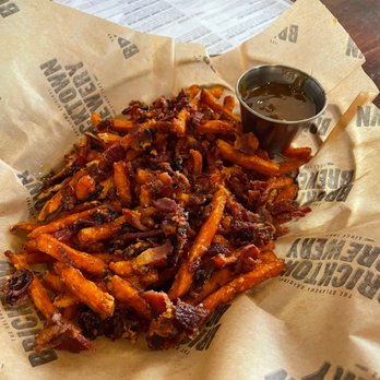Bricktown Brewery - Sweet potatoes drizzled w/ salted caramel.... Delicious!!! - American Near Me - Fort Smith, Arkansas