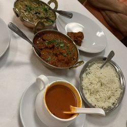 Mantra Indian Cuisine - From left to right: Mantra Chicken a la Carte, Lamb Vindaloo a la Carte, Tomato Soup, Basmati Rice Plate