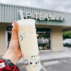 Velvet Osmanthus fresh milk tea with boba and QQ noodles