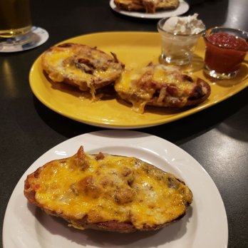 Legends - Loaded potato skins with pulled pork and bacon!!! - American Near Me - State College, Pennsylvania Legends - Loaded potato skins with pulled pork and bacon!!! - American Near Me - State College, Pennsylvania