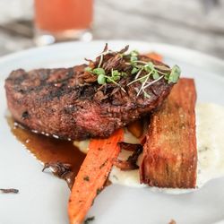 Lovango Resort + Beach Club - 8 oz filet mignon with steamed carrot and potato
