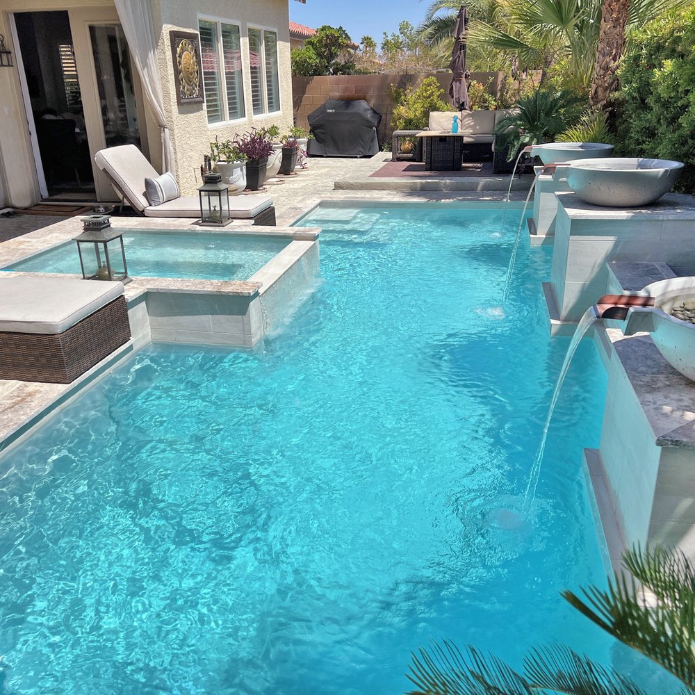 Pools R Us - Replace red flagstone with travertine and neutral gray tiling - Pool & Hot Tub Service Near Me - Las Vegas, Nevada Pools R Us - Replace red flagstone with travertine and neutral gray tiling - Pool & Hot Tub Service Near Me - Las Vegas, Nevada