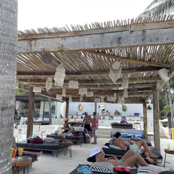 Guru Beach Club - Lounge beds, Infiniti pool - Beach Bars Near Me - Isla Mujeres, ROO Guru Beach Club - Lounge beds, Infiniti pool - Beach Bars Near Me - Isla Mujeres, ROO