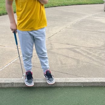 Miniature Golf at Eisenhower Park - It's a picture of me laughing at my step dad for almost getting a whole in one but barley missing - Mini Golf Near Me - East Meadow, New York Miniature Golf at Eisenhower Park - It's a picture of me laughing at my step dad for almost getting a whole in one but barley missing - Mini Golf Near Me - East Meadow, New York