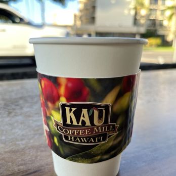 Ka'ū Coffee Roasters Cafe - Small coffee at outside table - Coffee & Tea Near Me - Kailua-Kona, Hawaii Ka'ū Coffee Roasters Cafe - Small coffee at outside table - Coffee & Tea Near Me - Kailua-Kona, Hawaii
