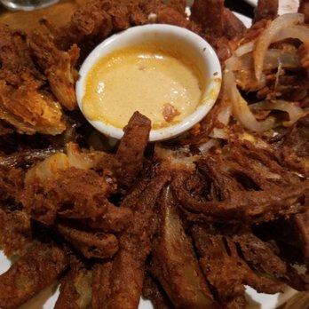 Outback Steakhouse - 2nd try of the blooming onion after getting overcooked one.. the core part of it wasn't fully cooked. - Steakhouses Near Me - Arcadia, California Outback Steakhouse - 2nd try of the blooming onion after getting overcooked one.. the core part of it wasn't fully cooked. - Steakhouses Near Me - Arcadia, California