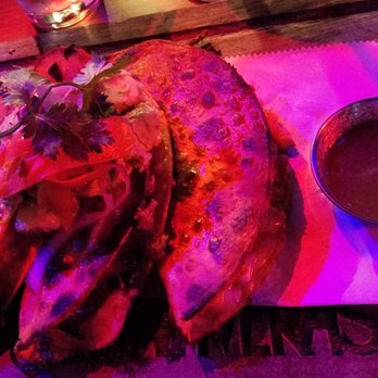 Kalaveras - a plate of food on a table - Bars Near Me - Riverside, California Kalaveras - a plate of food on a table - Bars Near Me - Riverside, California