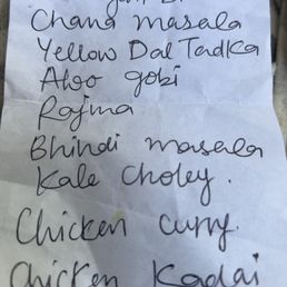 Edited to include the handwritten note listing all of the foods that are dairy free and vegan, except the chicken entrées