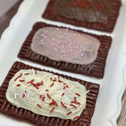 Sarah's Dessert Bar - Home made Pop tarts made with red velvet crust and nutella filling.