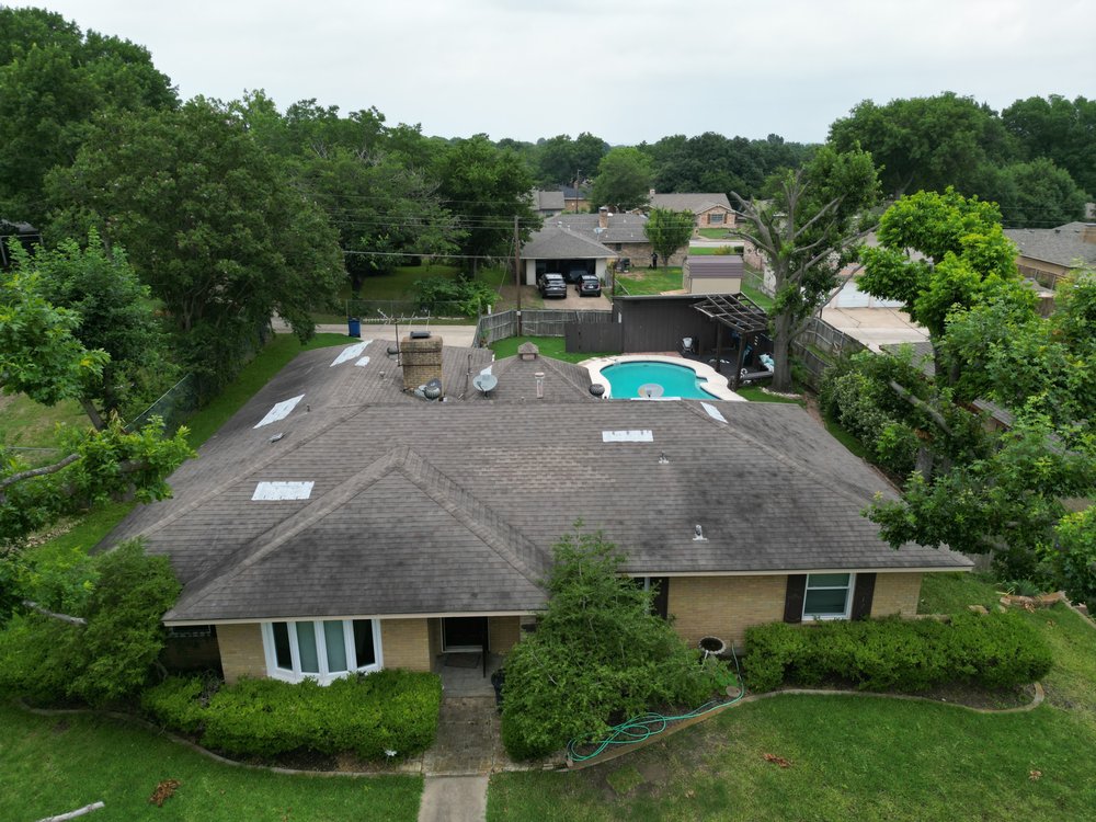 Slide of Taylored Roofing
