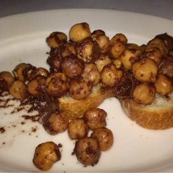 Babbo - Complimentary marinated chick pea dish to start...some has been eaten already :) - Italian Near Me - New York, New York
