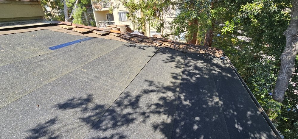 Slide of J&V Roofing Service