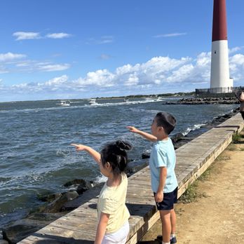 Barnegat Lighthouse - What's over there!? A boat, a boat! - Landmarks & Historical Buildings Near Me - Barnegat Light, New Jersey