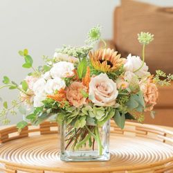 Flowers by Maryjane - Soft orange and peach, low and lush bouquet