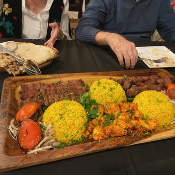 Caroun Restaurant - Family Platter for Three: chicken / beef with rice and grilled tomatoes, onions and parsley - Mediterranean Near Me - Phoenix, Arizona