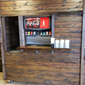 ZZQ Smokehouse - Just admiring the woodwork around the fountain - Barbeque Near Me - Eagan, Minnesota