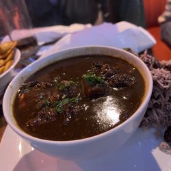 Ruby Tuesday Soul Food - Oxtail soup with jollof rice (before the pour)