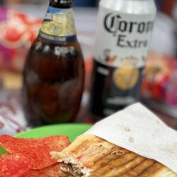 Tortas La Samaritana - The milanesa with manchego, a beer and hot chips