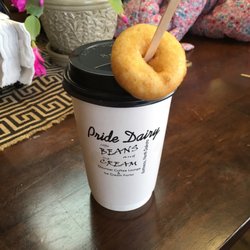 Pride Dairy - Delicious coffee with a side of donut !
