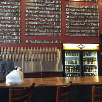 J. Henry's Draught House & Kitchen - Inside looking at the beer wall - New American Near Me - Houston, Texas