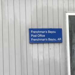 U S Postal Service - Sign next to public entrance