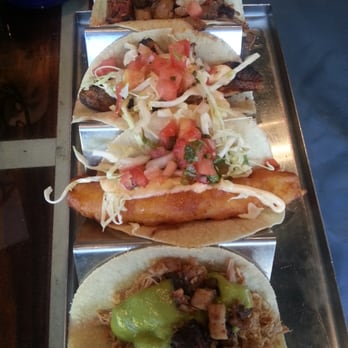 Session Taco - Delmar Loop - Front to back: Duck (sauce has some kick), fried fish (delish), grilled fish, brisket - Cocktail Bars Near Me - St. Louis, Missouri Session Taco - Delmar Loop - Front to back: Duck (sauce has some kick), fried fish (delish), grilled fish, brisket - Cocktail Bars Near Me - St. Louis, Missouri