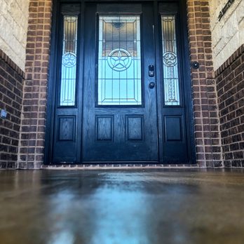 DC Decorative - the front door of a brick home - Flooring Near Me