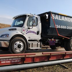 Salandro's Refuse - Our small hooklift truck is great for getting into tight driveways.