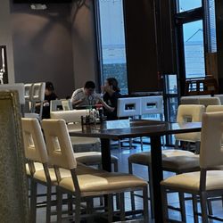Sakura Asian Bistro - Waiters eating while I was waiting for refill then 15 minutes later just wanted to pay and leave