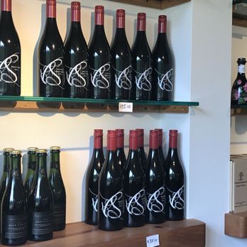 Venturi-Schulze Vineyards - bottles of wine on shelves - Wineries Near Me - Cobble Hill, British Columbia Venturi-Schulze Vineyards - bottles of wine on shelves - Wineries Near Me - Cobble Hill, British Columbia