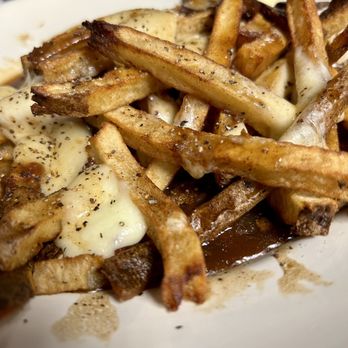 The Mill House Pub - Original Poutine - hand-cut russet potatoes, fresh beef gravy & cheese curds - Pubs Near Me - Mechanic Falls, Maine The Mill House Pub - Original Poutine - hand-cut russet potatoes, fresh beef gravy & cheese curds - Pubs Near Me - Mechanic Falls, Maine