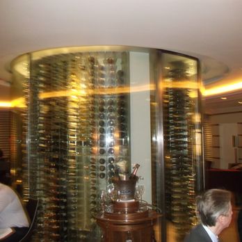 Petrus - Circular wine cellar in the middle - French Near Me - London, XGL