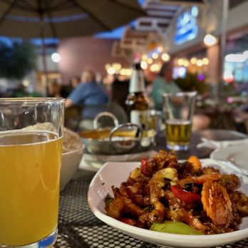 Noy’S TukTukThai On Sunrise - a plate of food and a glass of beer - Thai Near Me - Tucson, Arizona