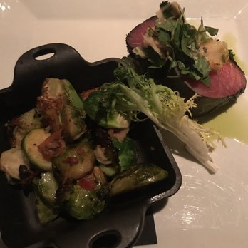 Rusty Pelican - Nori wrapped Saku tuna steak with roasted brussel sprouts and bacon. Tuna was perfectly seared on the bottom and so full of flavor. - Seafood Near Me - Tampa, Florida