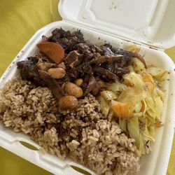 Clarenden Cuisine - Oxtail plate with rice and peas and cabbage