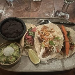 3 tacos; carne, fish, chicken. side black beans, guacamole 3 tacos; carne, fish, chicken. side black beans, guacamole